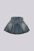 Top Tucked Into Pleated Denim Skirt