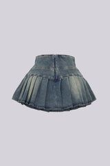 Top Tucked Into Pleated Denim Skirt