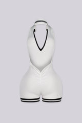 EDGEBYKS - Ribbed knit sleeveless collared romper featuring a plunging halter neckline, white back view