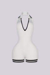 EDGEBYKS - Ribbed knit sleeveless collared romper featuring a plunging halter neckline, white front view