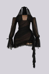 Ruched bodycon mini dress with a ruffled hem, lace trim detail, and nude tone lining
Mesh halter neckline with off shoulder long sleeves