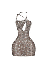 Asymmetrical neckline bodycon mini dress with single shoulder strap featuring teardrop keyhole and side cutouts
Sheer nude tone mesh overlay with crystal rhinestone embellishments details