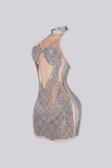 Sleeveless halter mini dress with an illusion nude mesh paneling with rhinestone accents