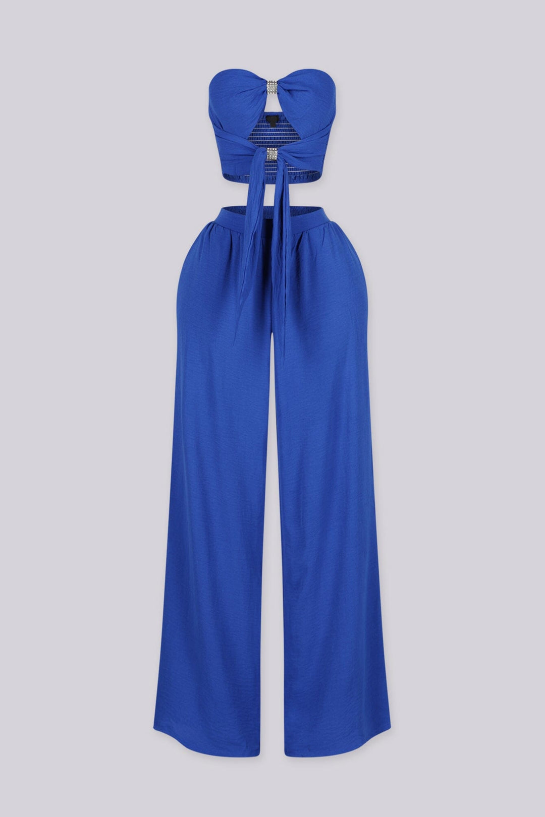 Chiffon tube top featuring central front cutout detailing with rhinestone buckle accent
Matching high waist wide leg pants with elastic waistband