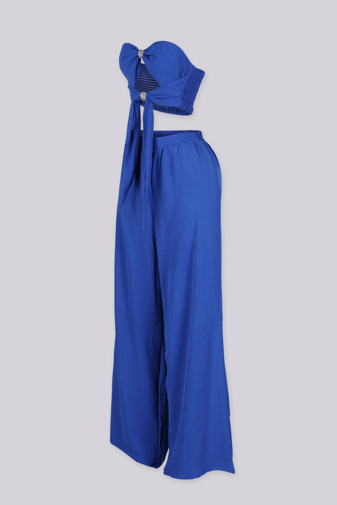 Chiffon tube top featuring central front cutout detailing with rhinestone buckle accent
Matching high waist wide leg pants with elastic waistband