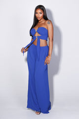 Chiffon tube top featuring central front cutout detailing with rhinestone buckle accent
Matching high waist wide leg pants with elastic waistband