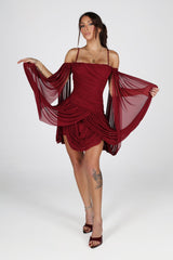 Sheer mesh mini dress with thin straps featuring oversized bishop sleeves balloon out from the shoulder