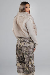 Soft faux fur full length collared jacket with ribbed long sleeve knit contrast and elastic knit hem