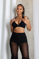 Ribbed knit cropped deep V neck halter top with open back design