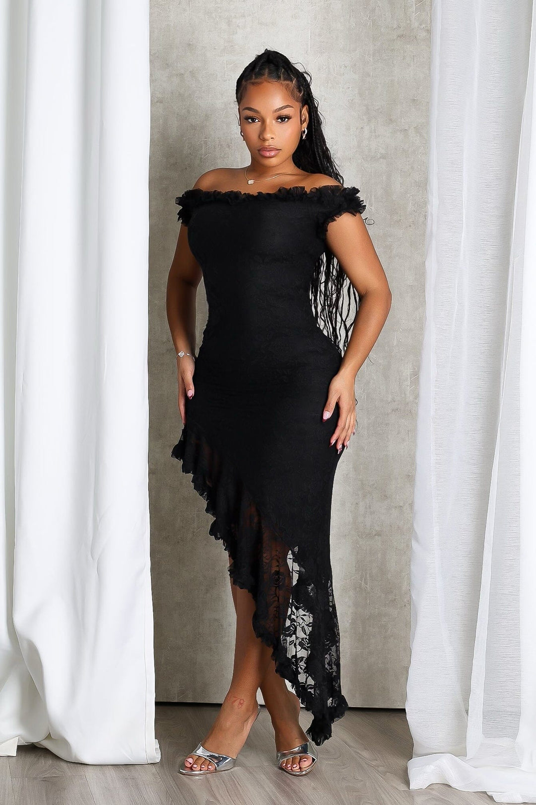 EDGE — black floral lace off-shoulder midi dress with a ruffled asymmetric hem, front view on model