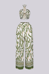 crop bandeau top with halter neckline featuring vertical cutout joined by linked O-ring detailing
Matching high waisted wide leg palazzo pants with wide waistband
