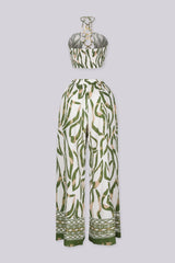 crop bandeau top with halter neckline featuring vertical cutout joined by linked O-ring detailing
Matching high waisted wide leg palazzo pants with wide waistband