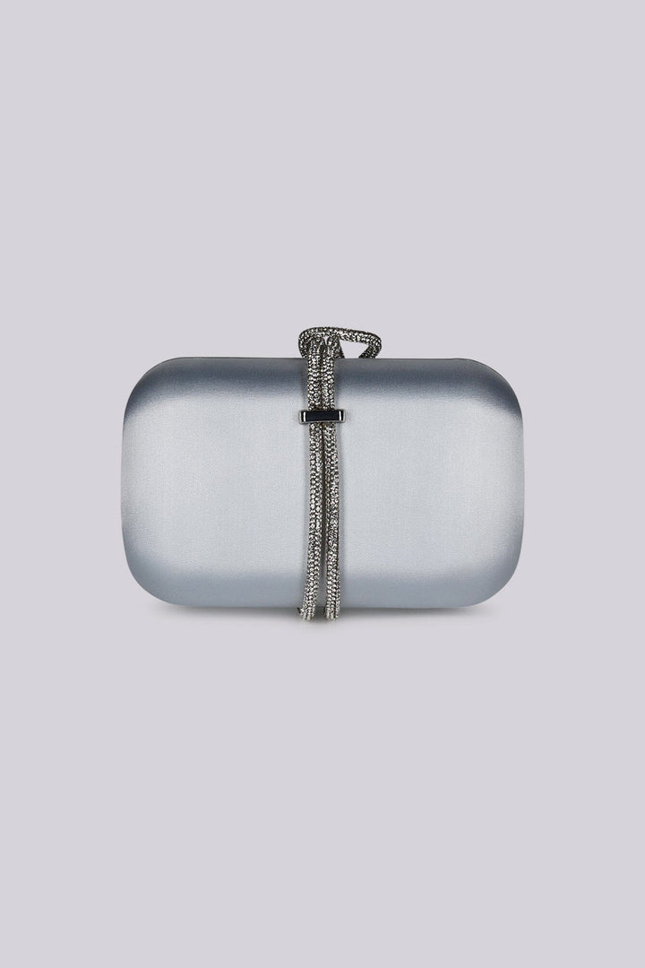 EDGE — silver satin evening clutch with rhinestone-wrapped top handle, front view flat lay