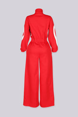 Zip front utility jumpsuit featuring contrast panel detailing at the chest and legs
Finished with a fixed waist detail and a long wide-leg fit