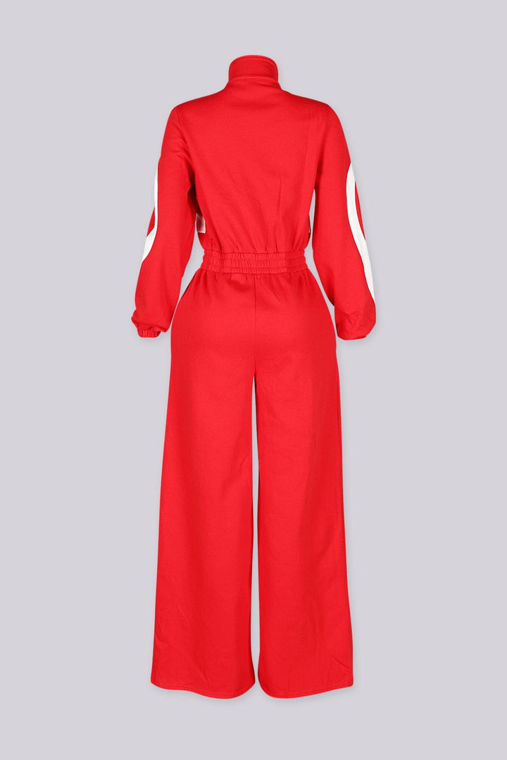 Zip front utility jumpsuit featuring contrast panel detailing at the chest and legs
Finished with a fixed waist detail and a long wide-leg fit