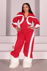 Zip front utility jumpsuit featuring contrast panel detailing at the chest and legs
Finished with a fixed waist detail and a long wide-leg fit