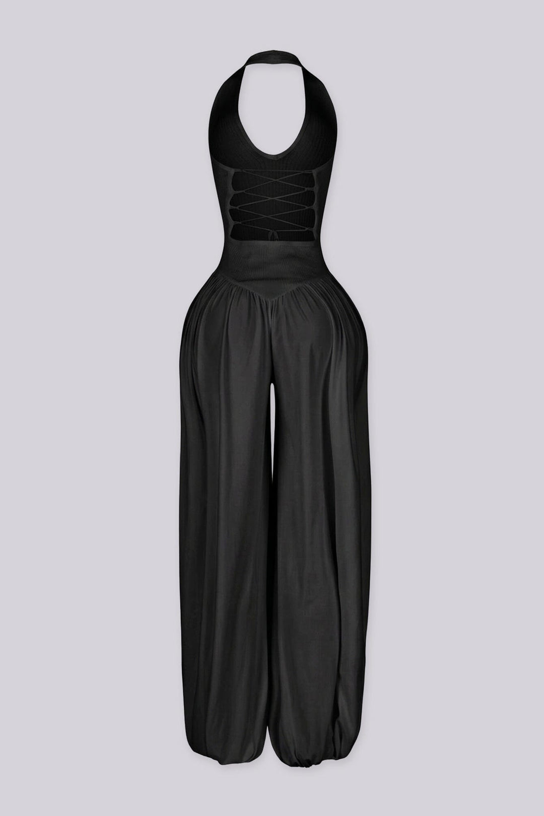 Ribbed knit halter neckline jumpsuit with voluminous balloon leg silhouette
Open back with lace-up closure