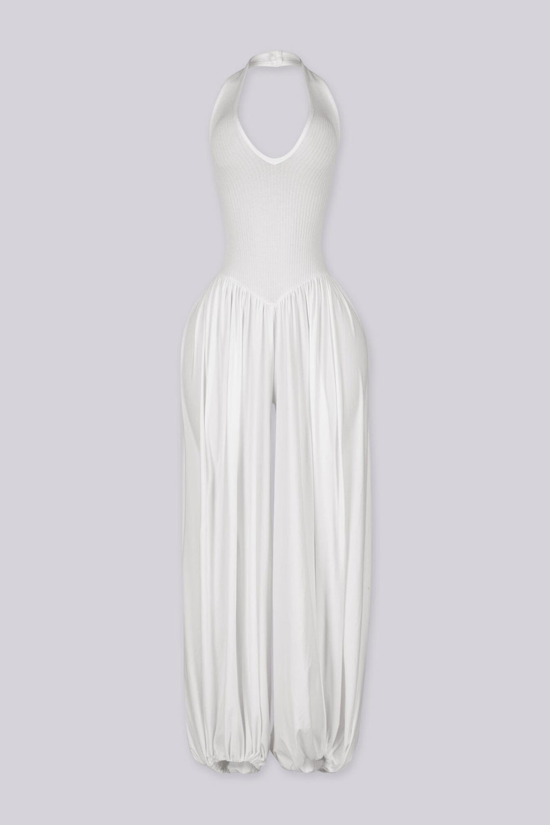 Ribbed knit halter neckline jumpsuit with voluminous balloon leg silhouette
Open back with lace-up closure