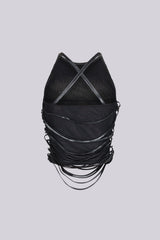 EDGE — black mesh faux leather wrap top, side view on model