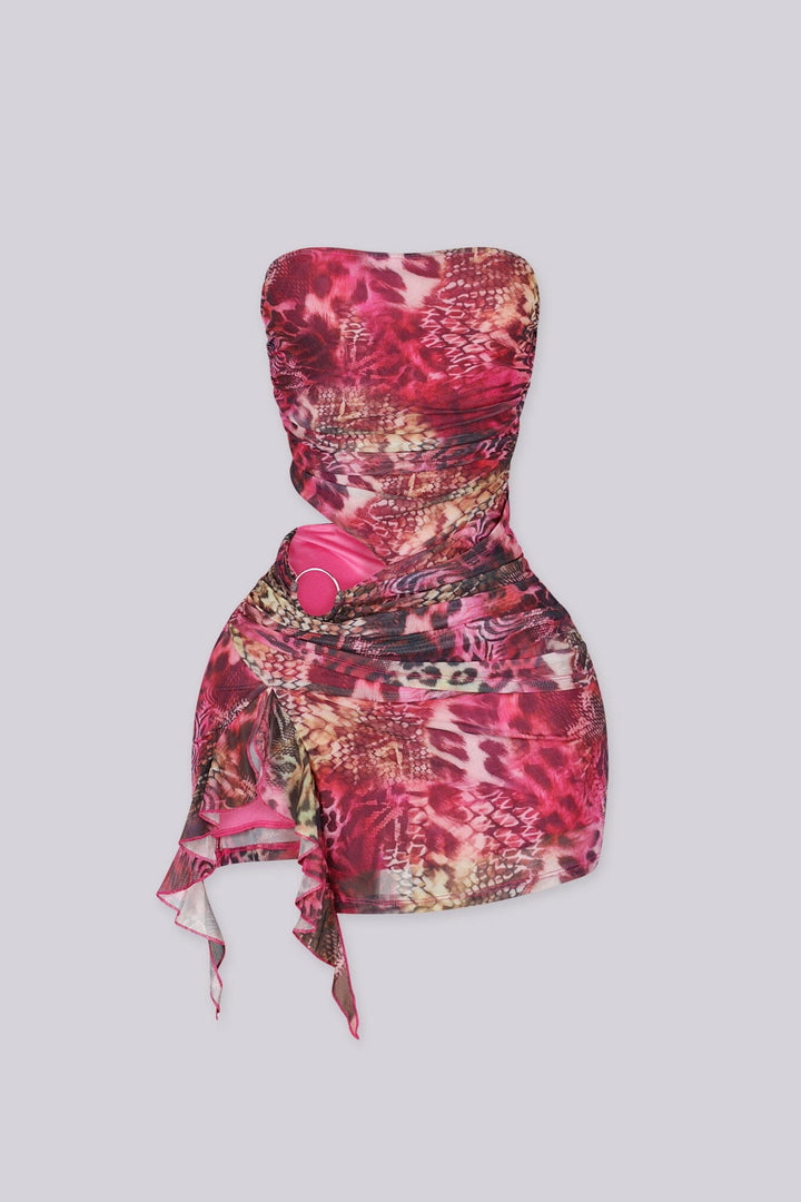 Sheer mesh tube mini dress with bold side cutout with metal ring detail
Asymmetric flowing hem creates a sculpted silhouette