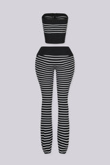 Ribbed knit stripe tube top featuring exposed full-length zipper closure at center front
Matching flare pants with fold-over waistband 