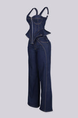 Denim bustier top with adjustable shoulder straps and vertical boning seams featuring peplum hem that flares at the hip