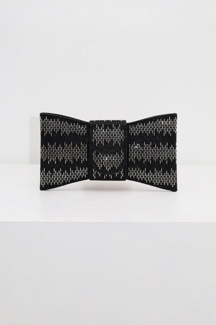 EDGE — black rhinestone bow-shaped evening clutch, front view flat lay