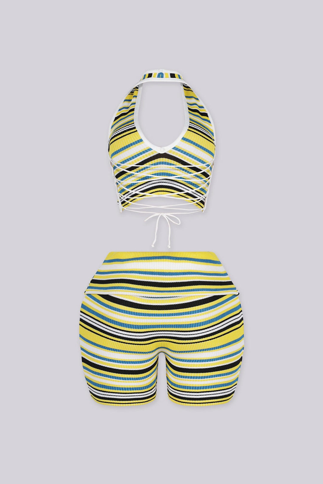 Plunging V-neck halter crop top with open back secured by an adjustable criss-cross lace-up tie closure
Matching mid-length biker shorts designed with adjustable fold-over waistband