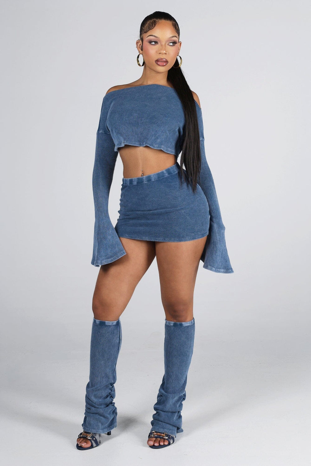 Mineral washed ribbed knit long sleeve crop top featuring asymmetrical neckline, Matching low rise skirt and leg warmers