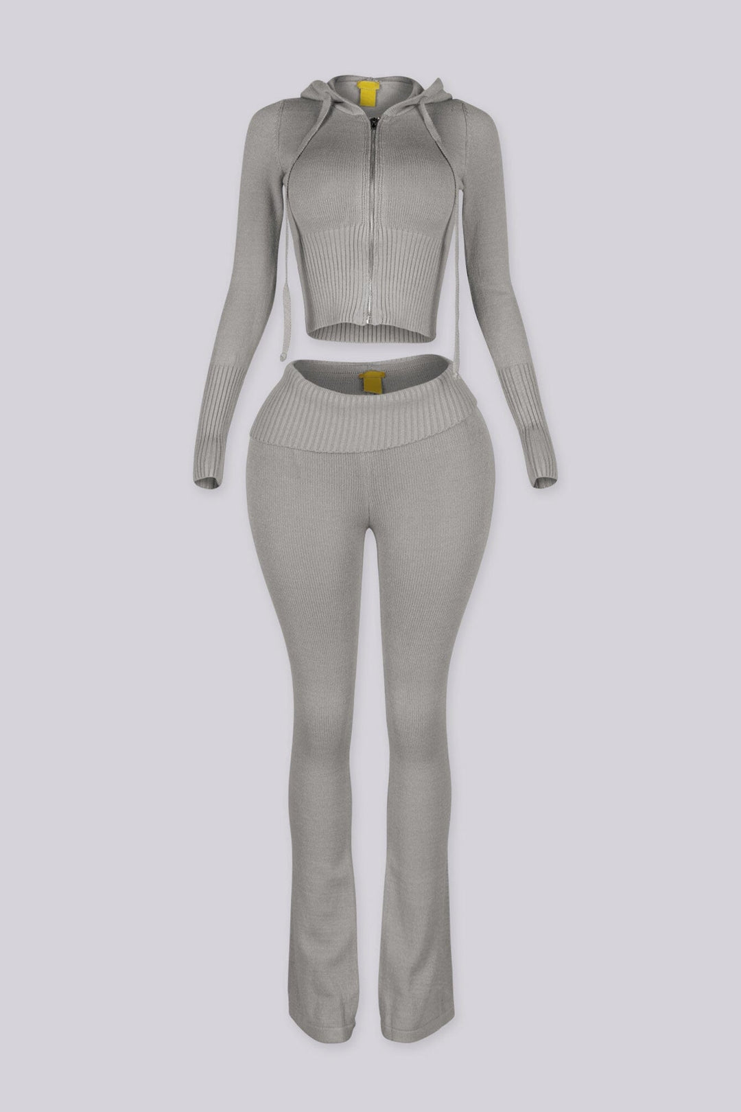 Cropped zip up knit hoodie with a drawstring hood featuring elongated slim sleeves and waist