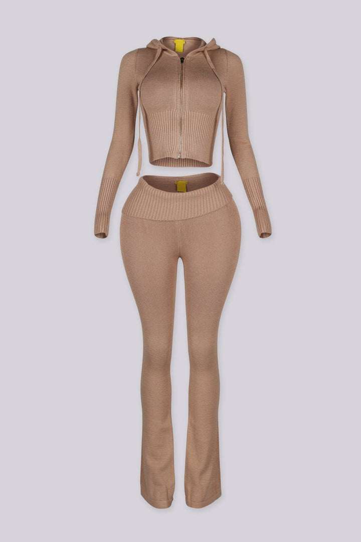 Cropped zip up knit hoodie with a drawstring hood featuring elongated slim sleeves and waist