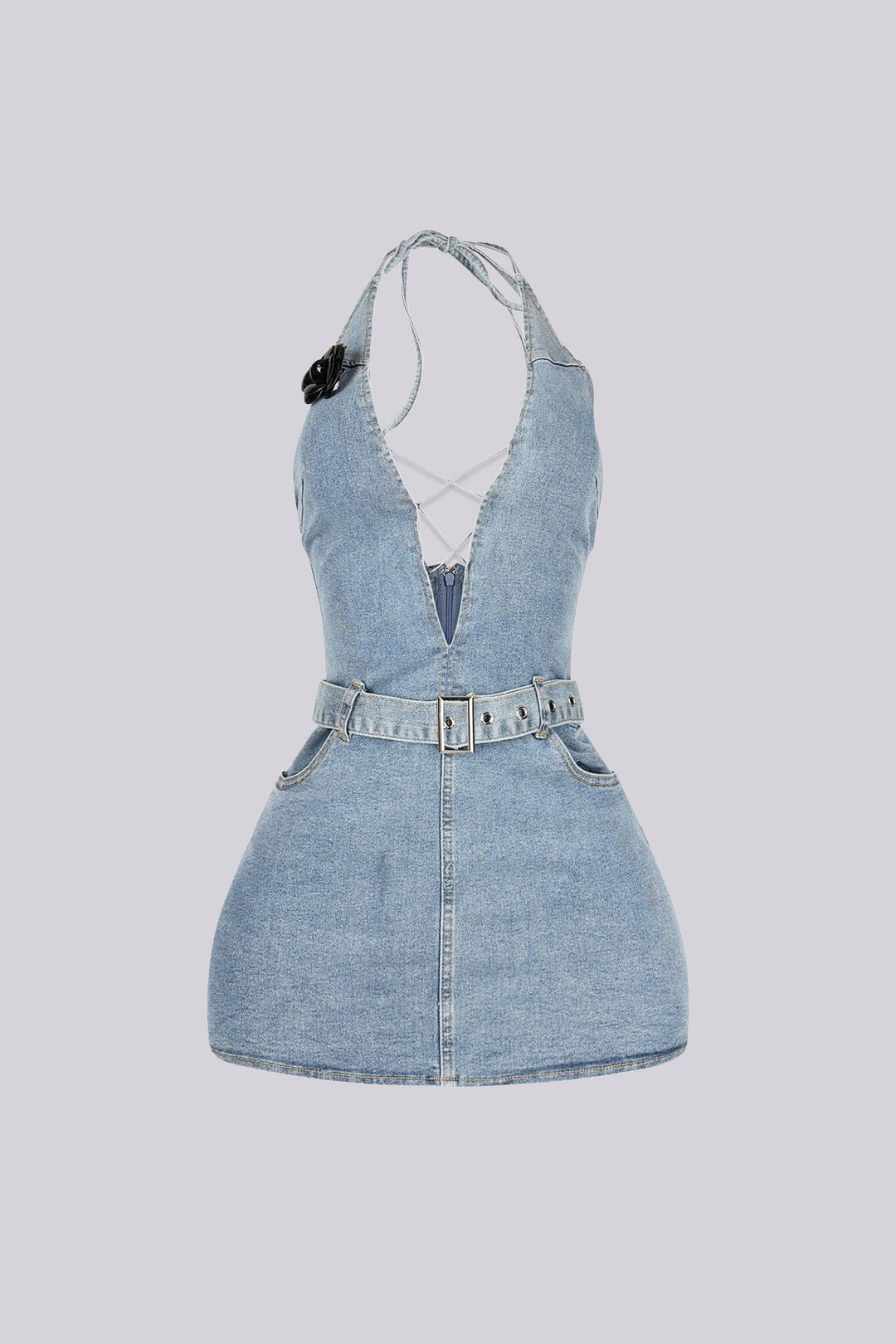 Washed denim halter mini dress with deep plunging V neck featuring center cutout with criss cross lace up detail