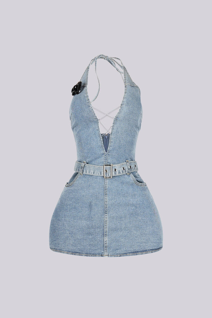 Washed denim halter mini dress with deep plunging V neck featuring center cutout with criss cross lace up detail