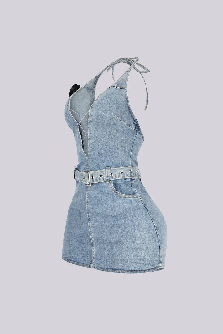 Washed denim halter mini dress with deep plunging V neck featuring center cutout with criss cross lace up detail