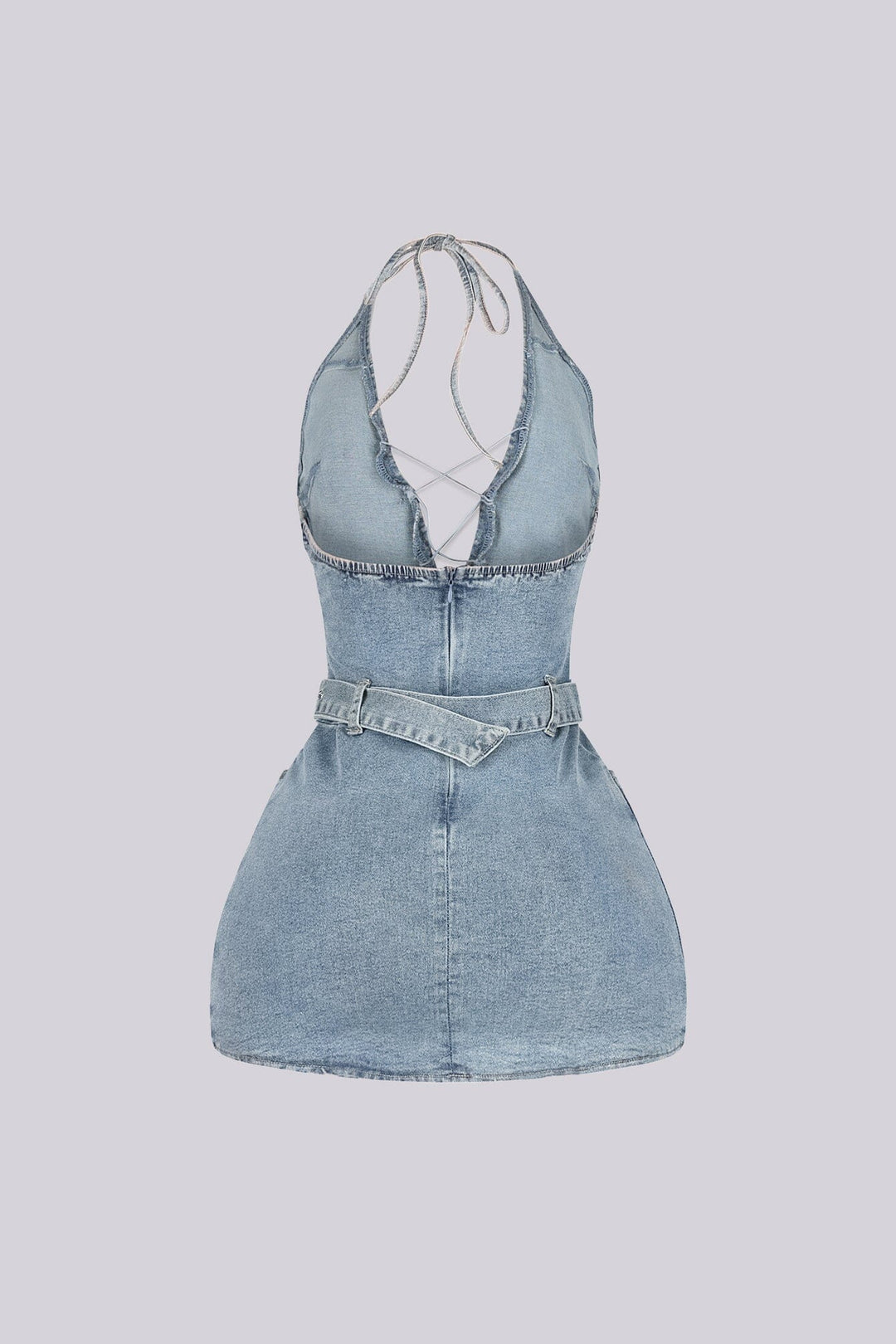 Washed denim halter mini dress with deep plunging V neck featuring center cutout with criss cross lace up detail