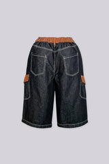 Wide leg denim bermuda shorts with a contrast corduroy waistband and pocket trim featuring diagonal seam detailing