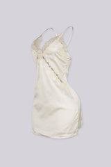 Satin slip mini dress featuring v neckline with lace detailing across the bodice