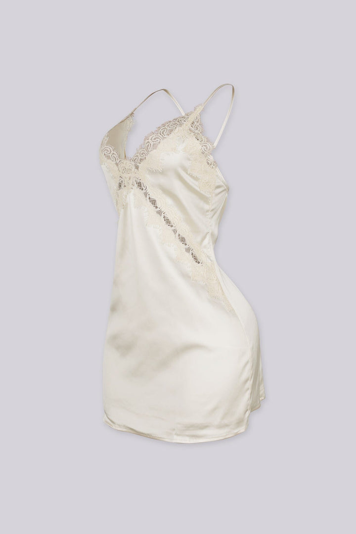 Satin slip mini dress featuring v neckline with lace detailing across the bodice