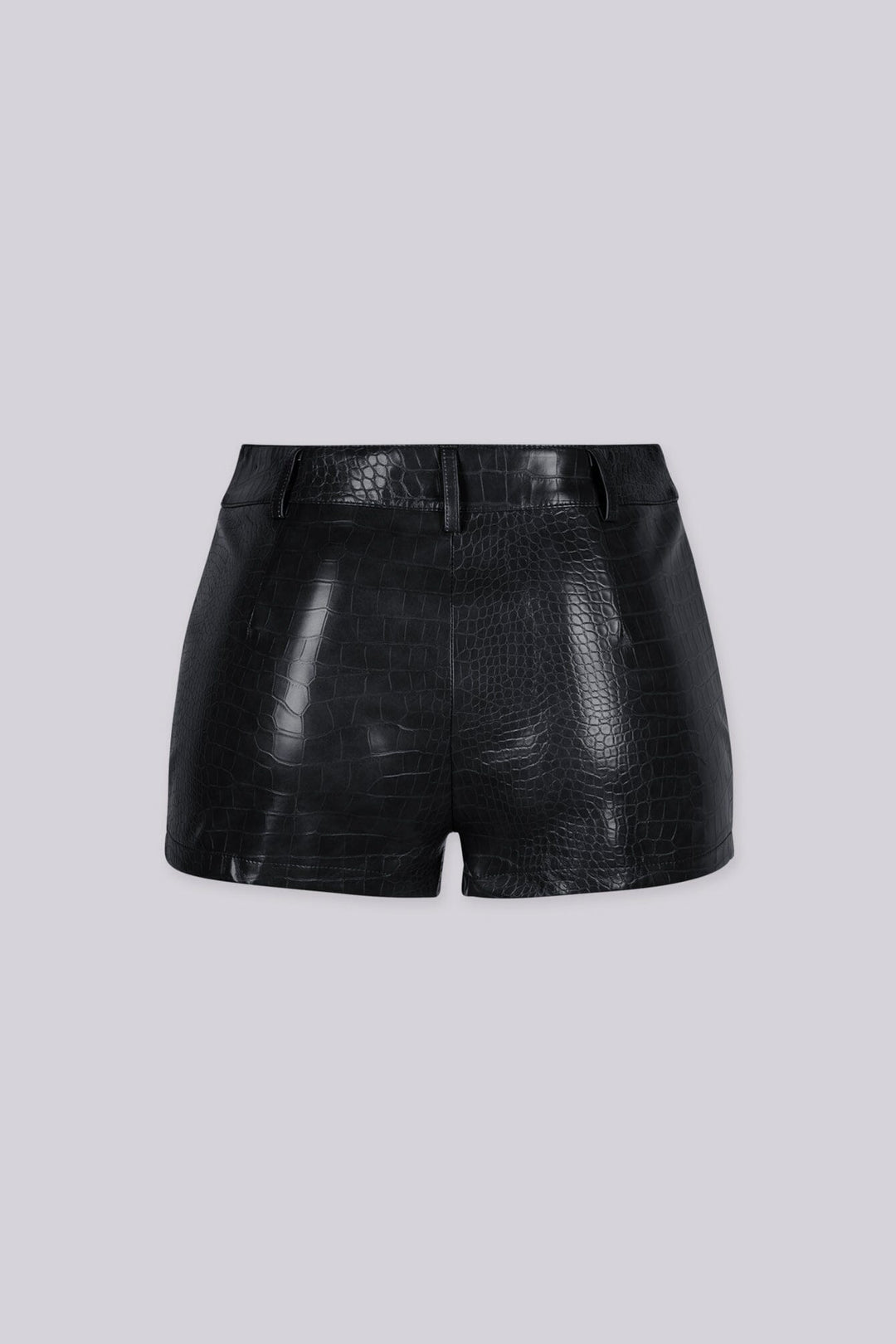 High waisted tailored fit shorts featuring textured croc embossed faux leather