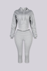 Cropped long sleeve hoodie with drawstring hood and curved ribbed hem