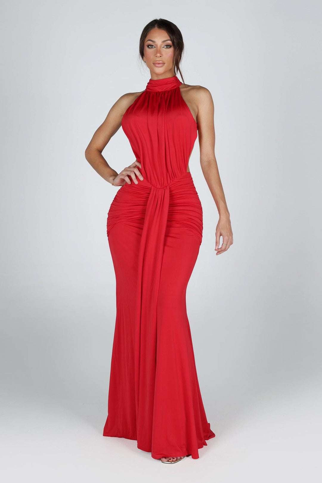 Halter neckline maxi dress featuring open cutout sides at the waist