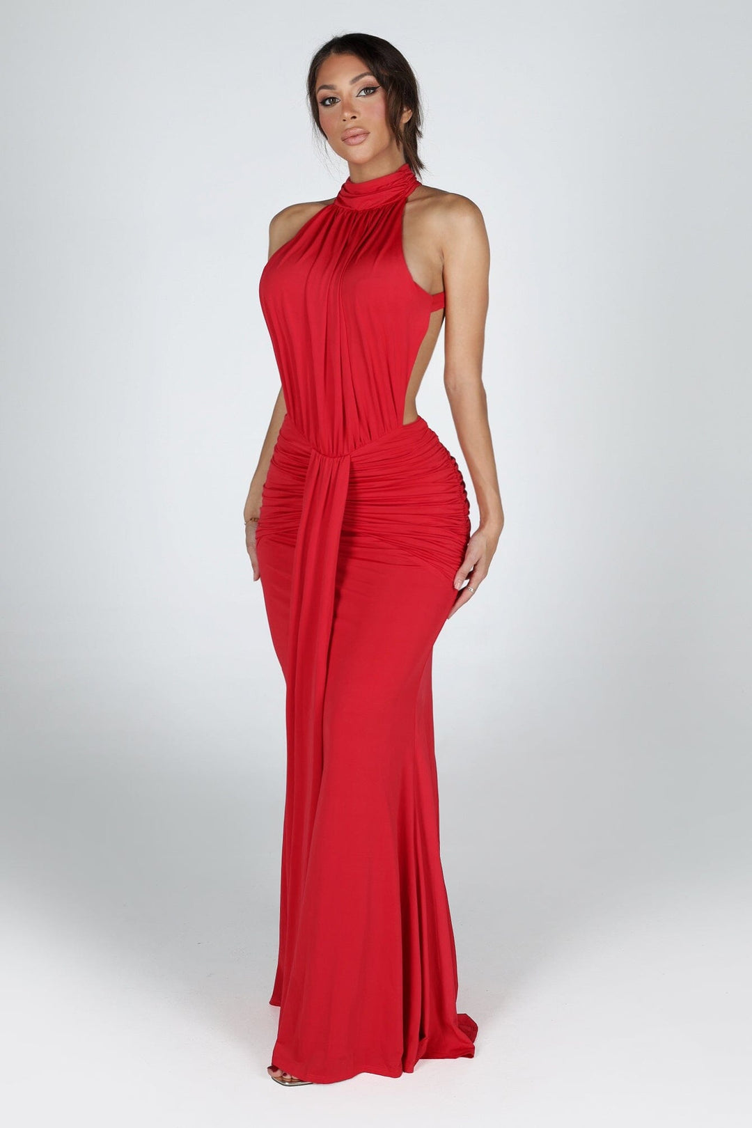 Halter neckline maxi dress featuring open cutout sides at the waist
