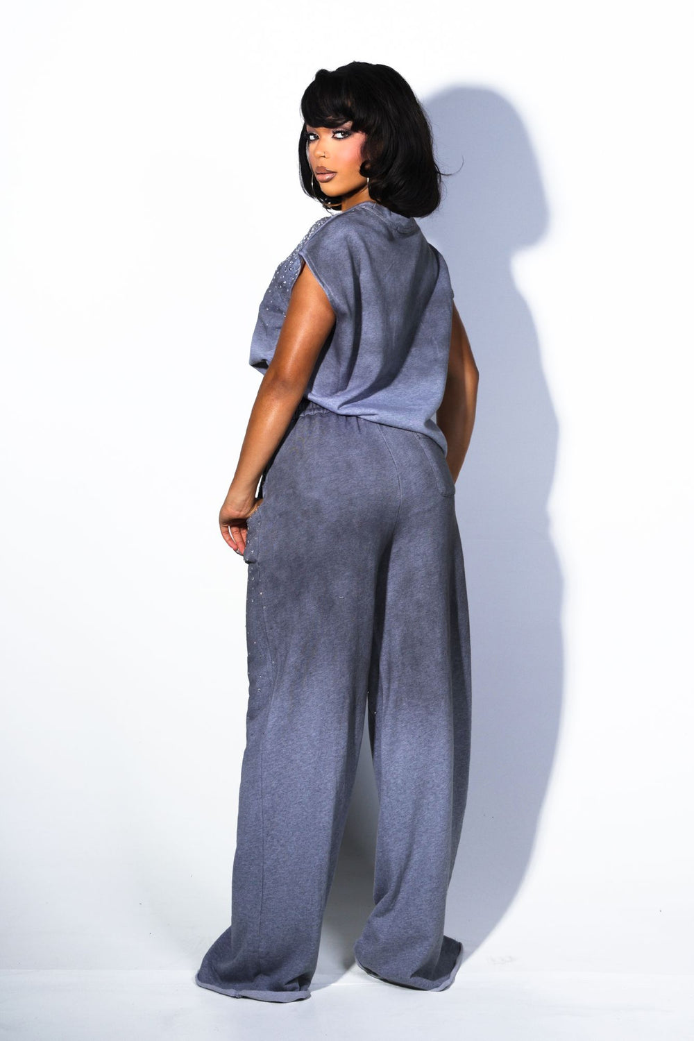 High waist denim fleece pants featuring rhinestone embellished details