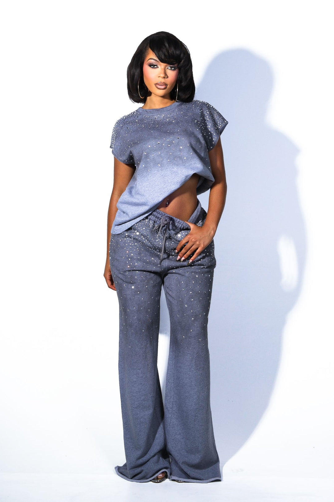 Relaxed boxy fit crew neck top featuring all over rhinestone embellishments