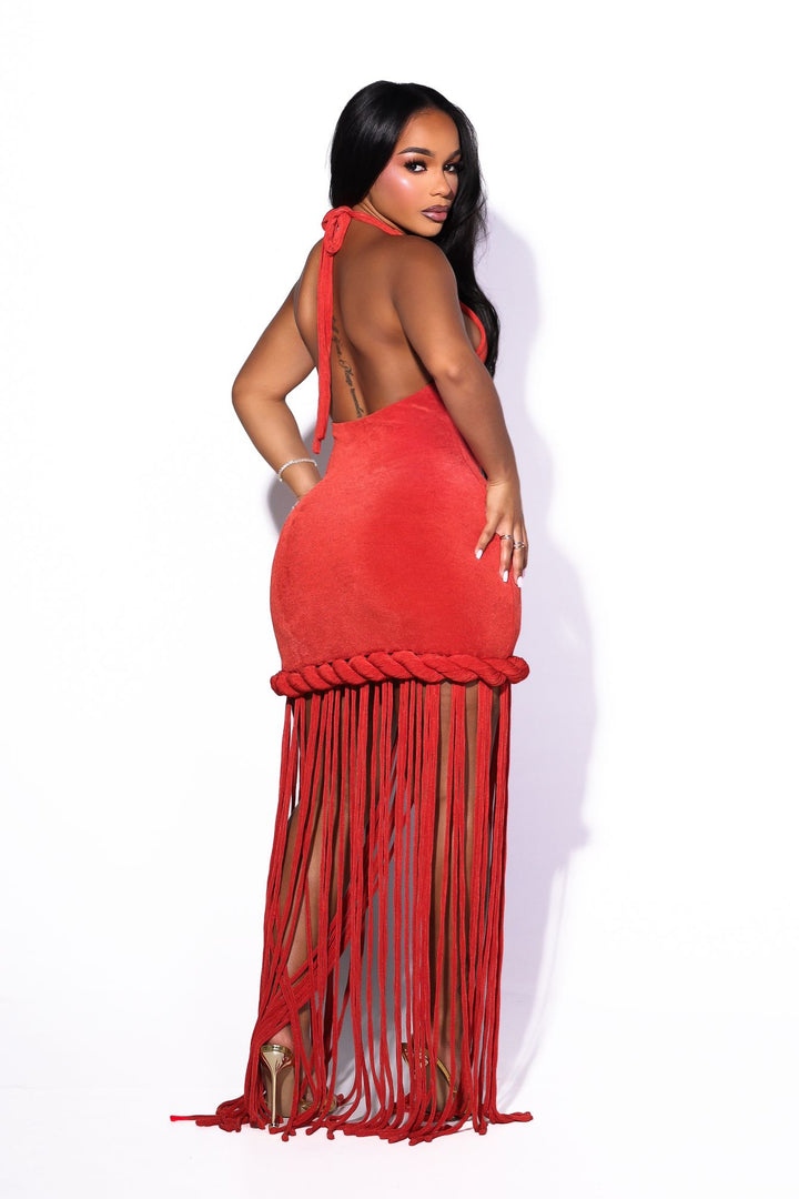 Tie back halter neck maxi dress fitted through the bodice, back view