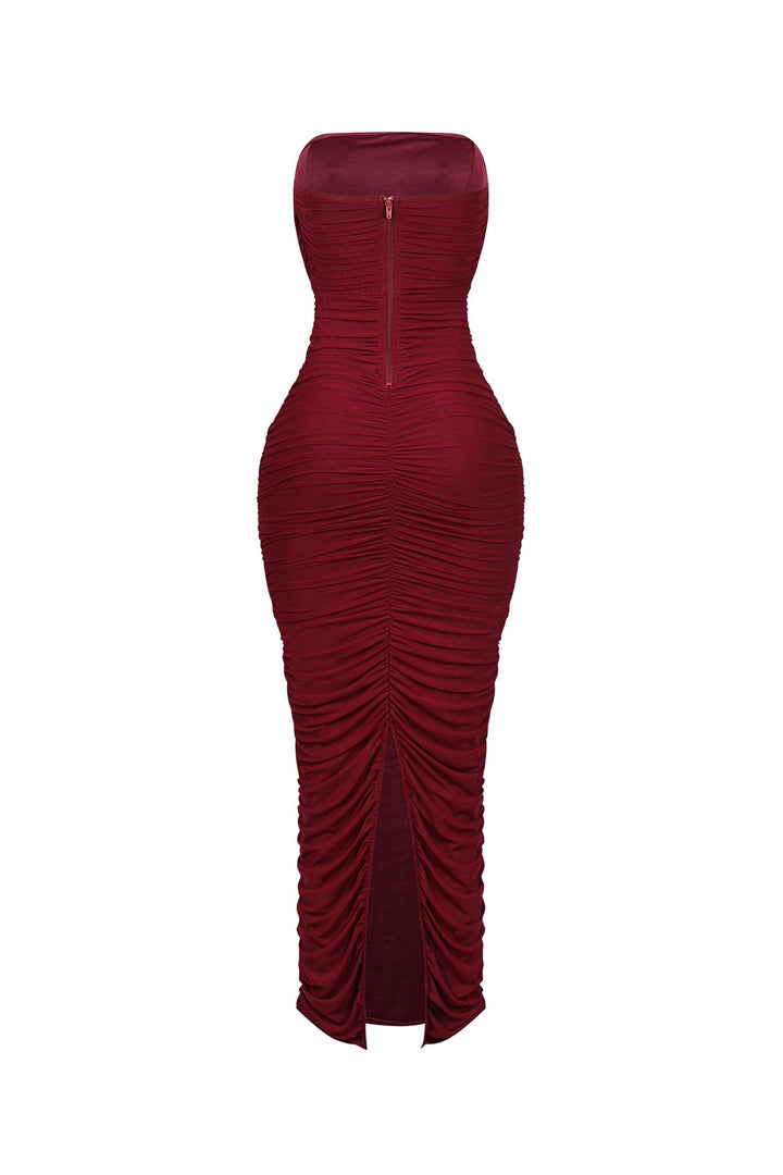 Bodycon mesh tube dress featuring horizontal ruched detailing throughout and a flattering back slit