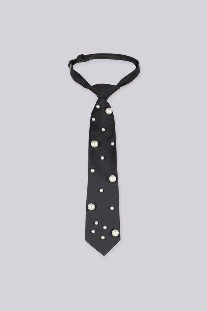 Black necktie embellished with large pearls, front view flat lay