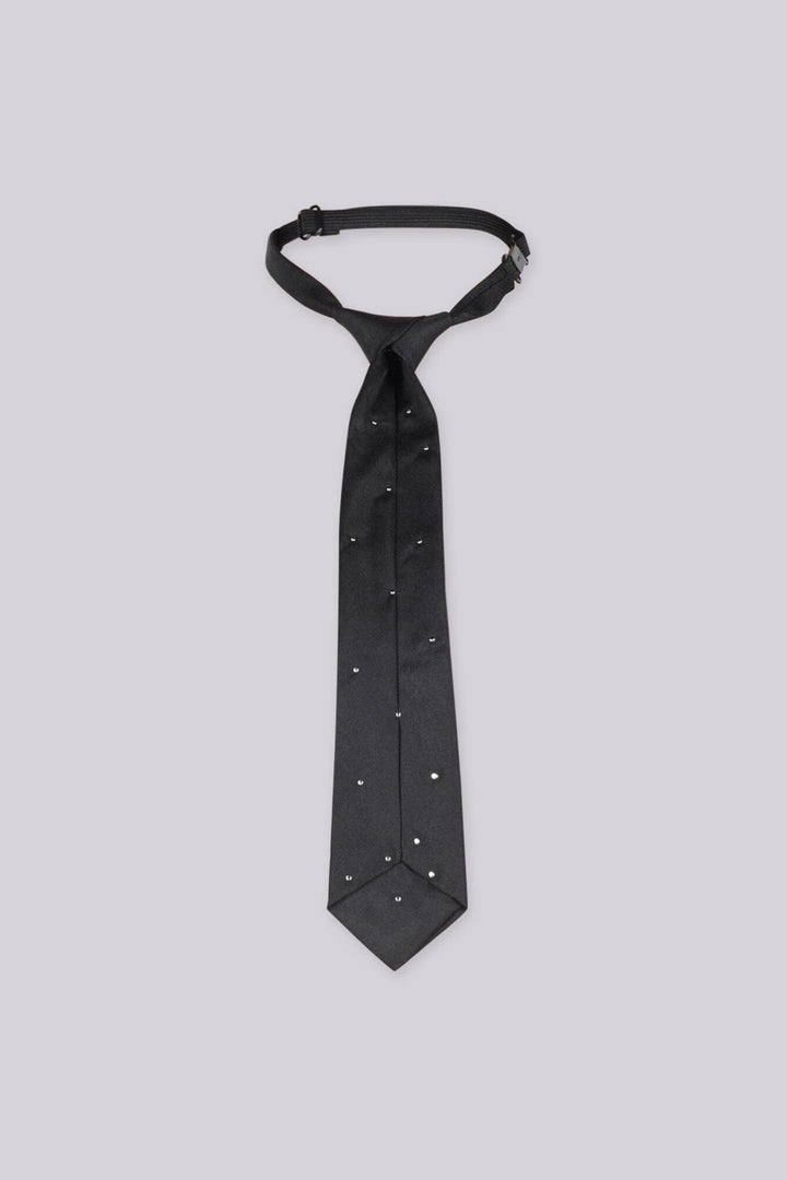 Black rhinestone-embellished necktie with scattered stud detailing, close-up flat lay