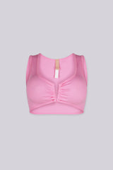 Ribbed knit crop tank top featuring V shape cutout at center front into a small ruched cinch