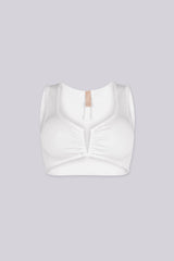 Ribbed knit crop tank top featuring V shape cutout at center front into a small ruched cinch